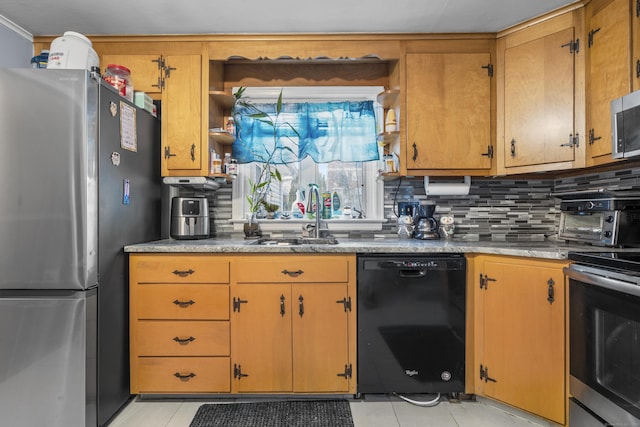 kitchen with light tile patterned floors, stainless steel appliances, sink, and backsplash