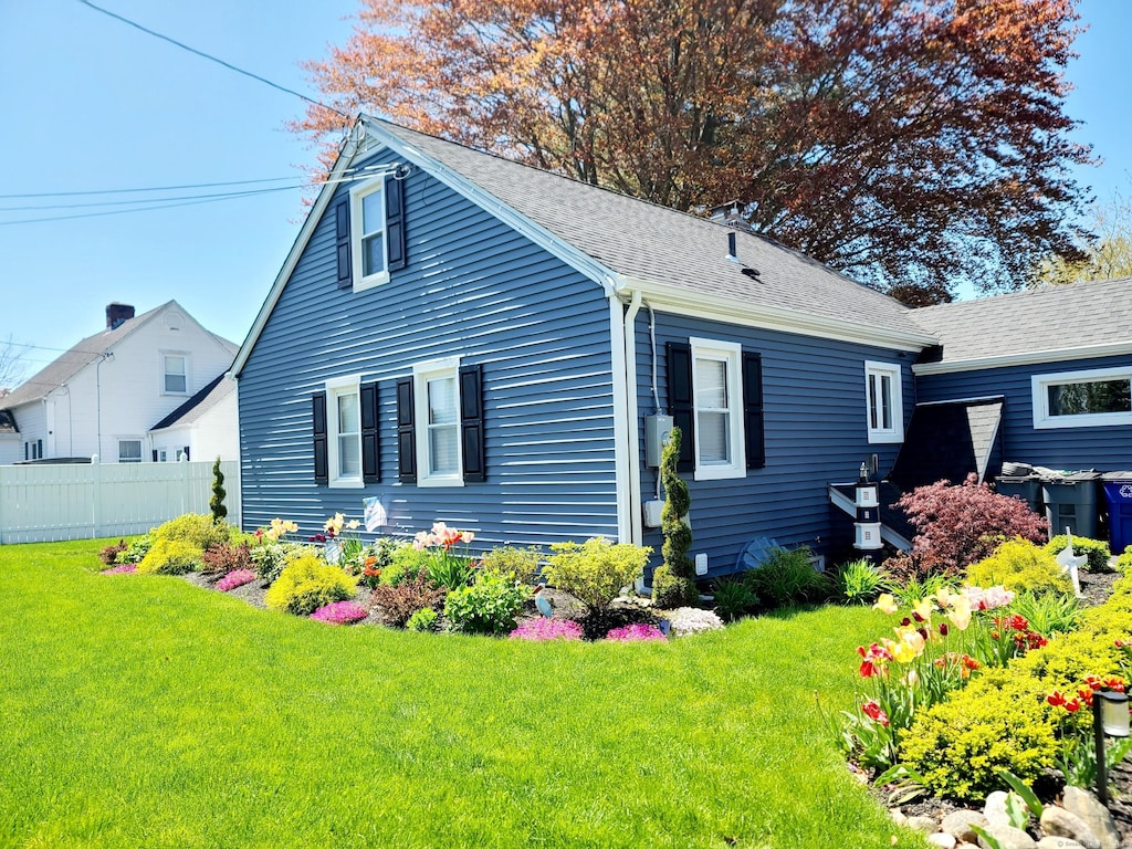 exterior space featuring a lawn