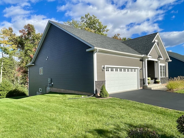 view of property exterior with a yard