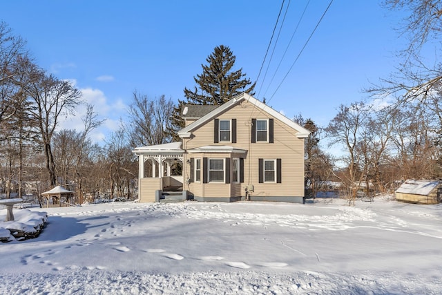 view of front of property featuring covered porch