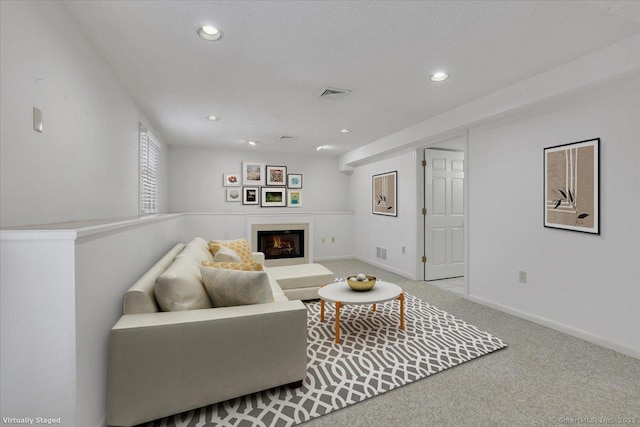 living room featuring light colored carpet