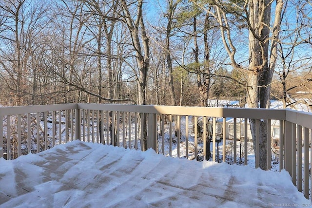 view of snow covered deck