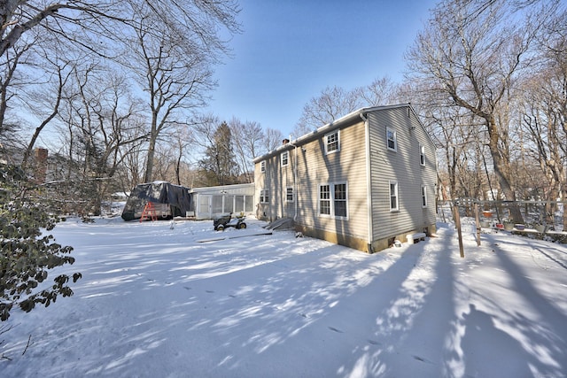 view of snow covered property