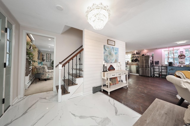 entrance foyer with a chandelier