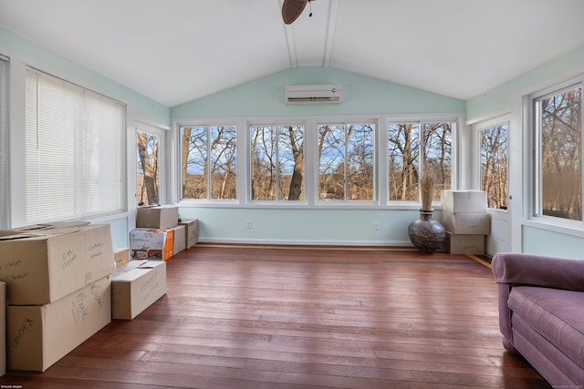 unfurnished sunroom with lofted ceiling and a wall mounted AC