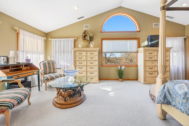 carpeted bedroom with lofted ceiling