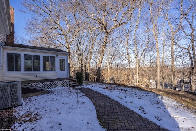 snowy yard with cooling unit