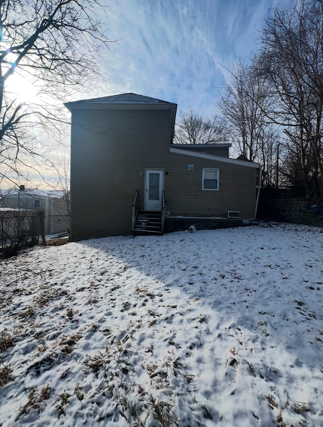 view of snow covered property