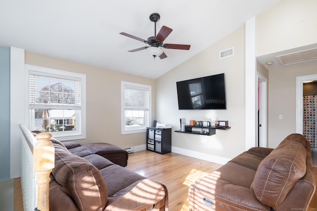 living room featuring ceiling fan, a baseboard radiator, vaulted ceiling, and light wood-type flooring