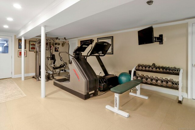 exercise room with crown molding