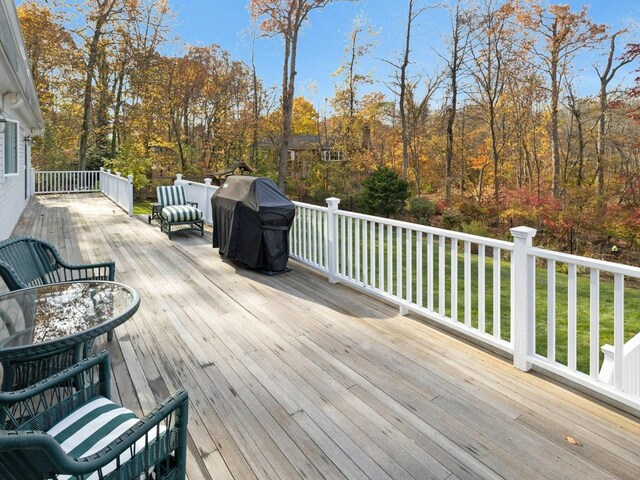 wooden terrace with grilling area