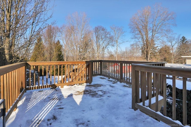 view of snow covered deck