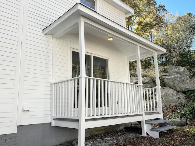 property entrance with covered porch