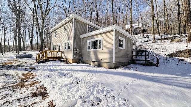 view of snow covered property