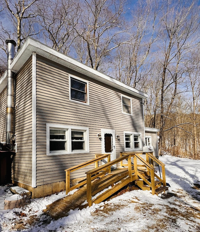 view of snow covered house