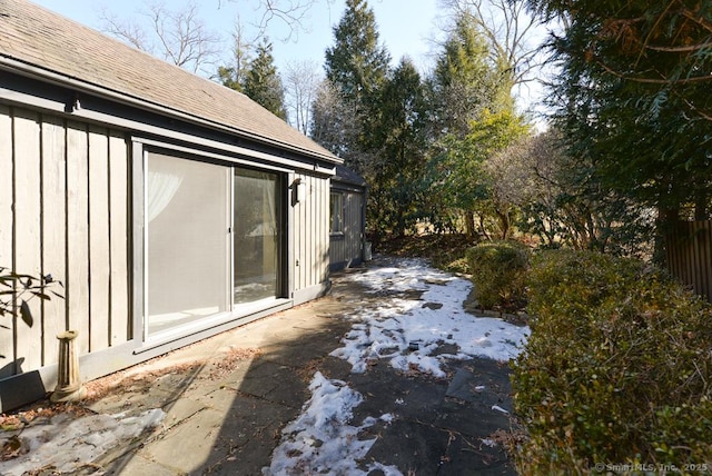 view of property exterior featuring a patio area