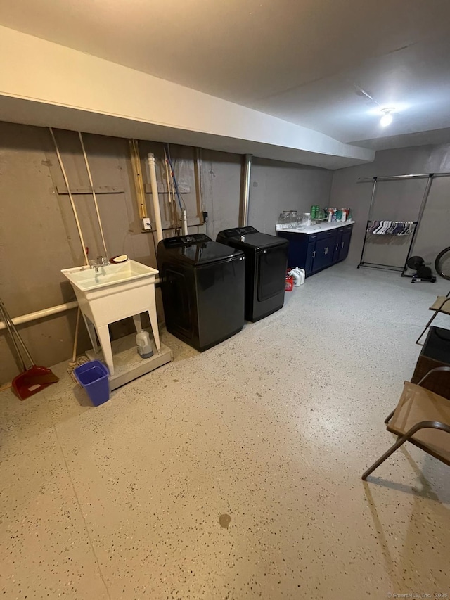 basement featuring independent washer and dryer