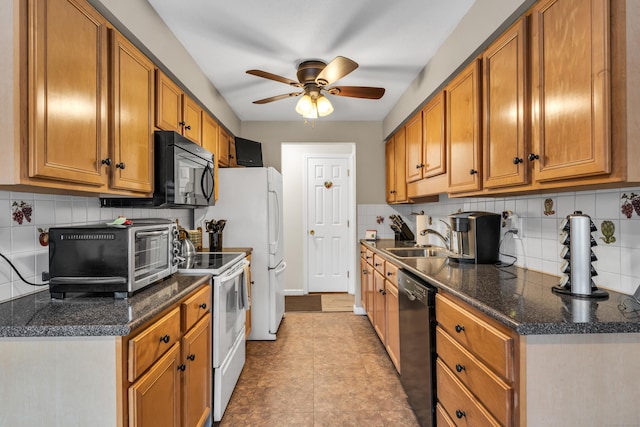 kitchen featuring tasteful backsplash, sink, ceiling fan, and black appliances