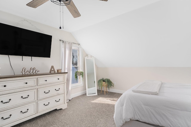 carpeted bedroom featuring ceiling fan and lofted ceiling