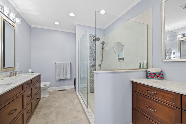 bathroom featuring crown molding, vanity, toilet, and a tile shower