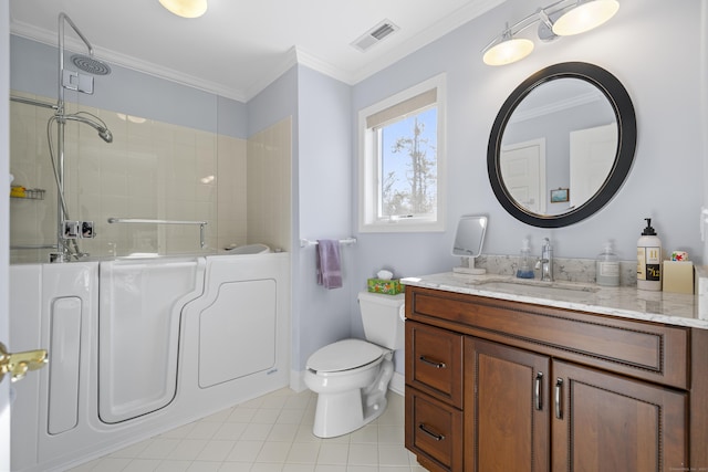 bathroom with a tile shower, vanity, crown molding, and toilet