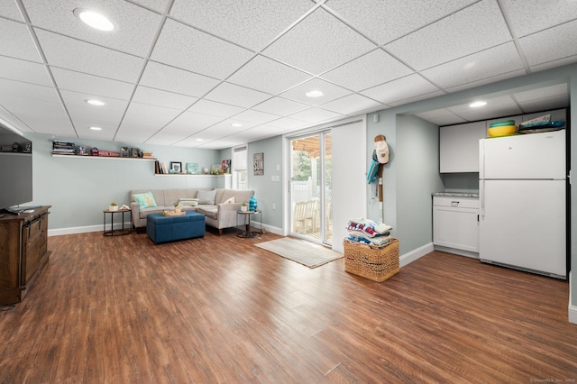 unfurnished living room with dark hardwood / wood-style flooring