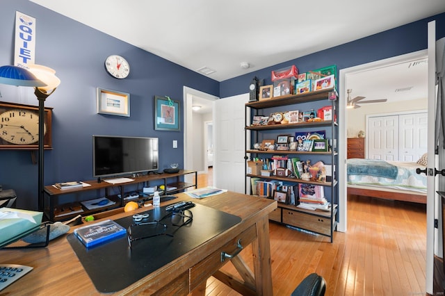 office with hardwood / wood-style floors