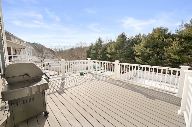 wooden deck with grilling area