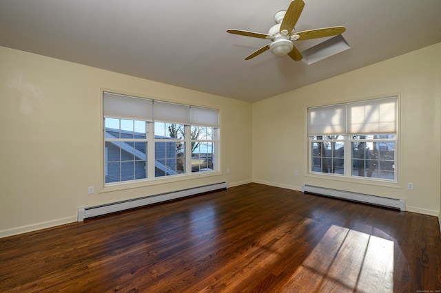 empty room with dark hardwood / wood-style flooring, vaulted ceiling, and baseboard heating