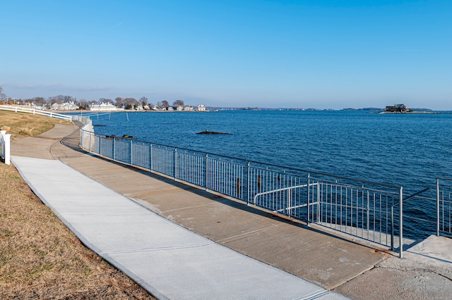 view of home's community featuring a water view