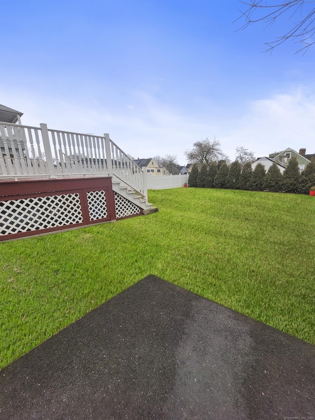 view of yard with a deck