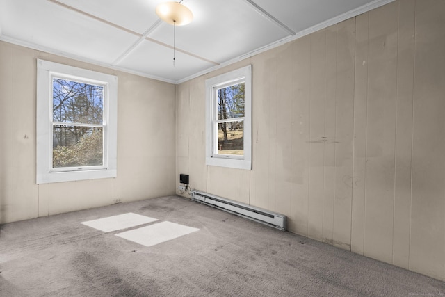 carpeted spare room featuring crown molding, plenty of natural light, and a baseboard radiator