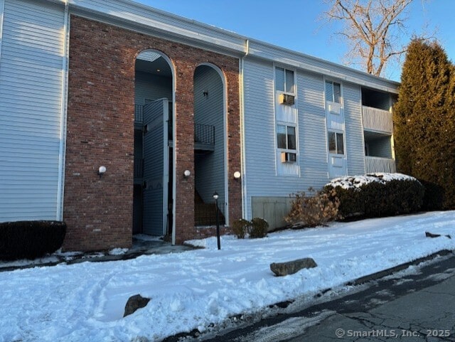 view of snow covered building