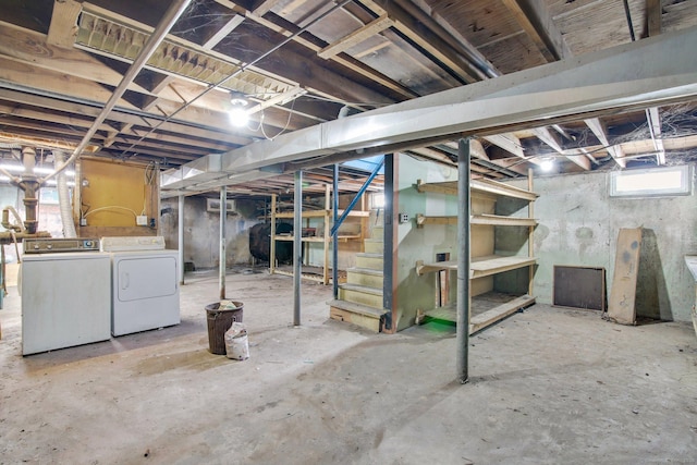 basement with washer and clothes dryer