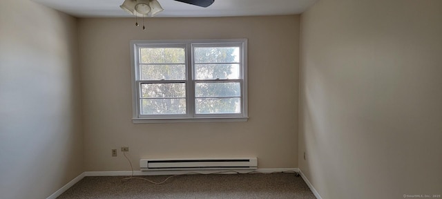 unfurnished room with ceiling fan, carpet, and baseboard heating