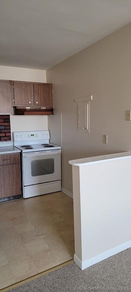 kitchen featuring white electric range oven