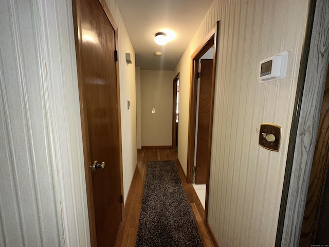 corridor featuring hardwood / wood-style flooring