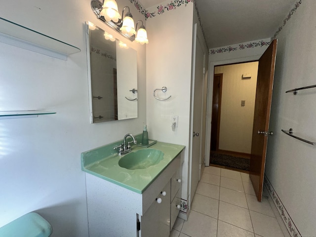 bathroom featuring tile patterned floors and vanity