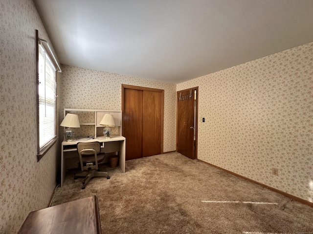 home office with carpet flooring