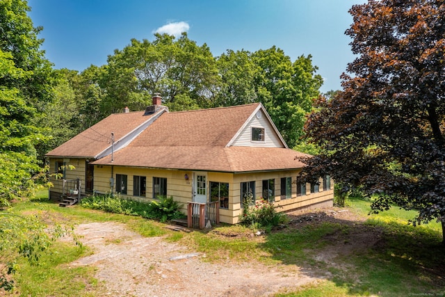 108 Fall Mountain Rd, Bristol, CT 06010 - view of front of house with a shingled roof and a chimney