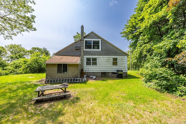 108 Fall Mountain Rd, Bristol, CT 06010 - rear view of property featuring a chimney and a lawn