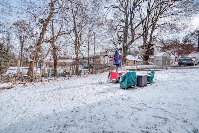 view of yard covered in snow