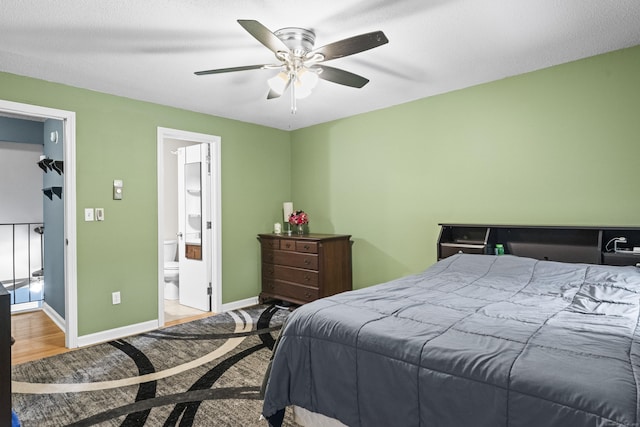 bedroom with connected bathroom and ceiling fan