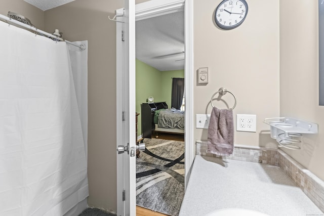 bathroom featuring a textured ceiling