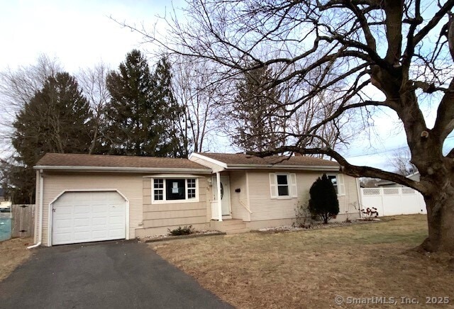 ranch-style house with a garage