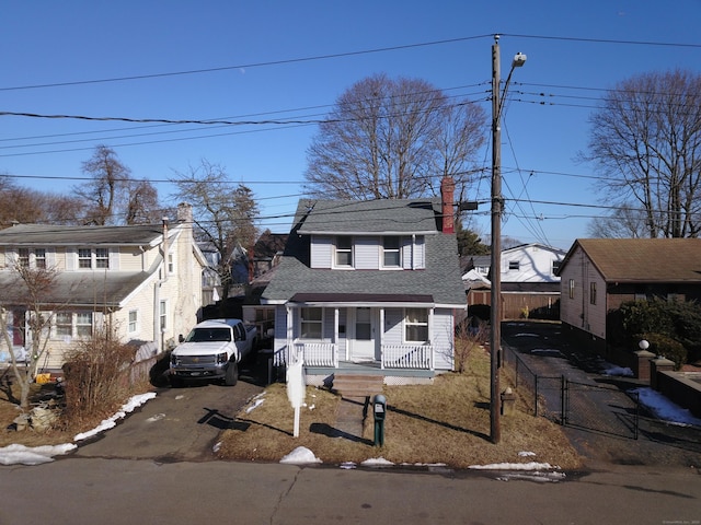 view of front of property featuring covered porch