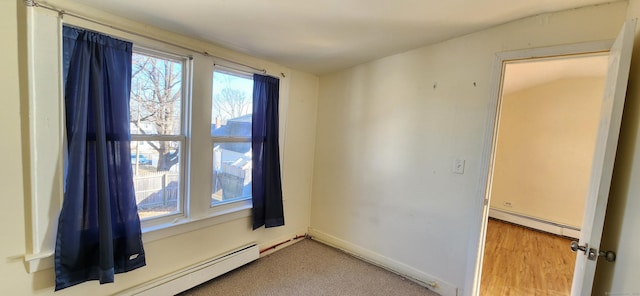 empty room featuring baseboard heating