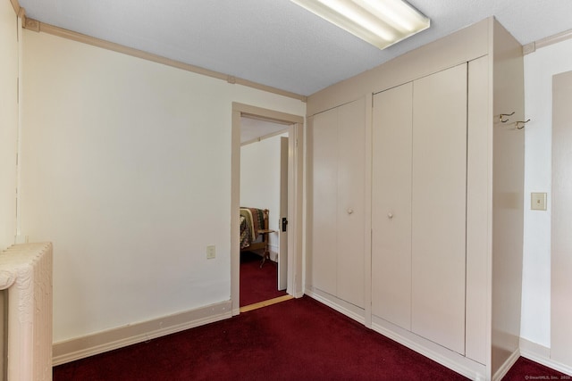 unfurnished bedroom with radiator heating unit