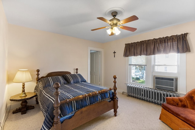 bedroom featuring cooling unit, ceiling fan, radiator heating unit, and light carpet