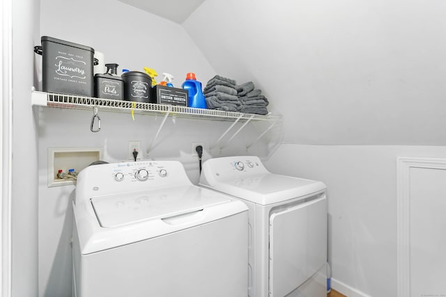 washroom with washer and dryer and laundry area